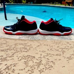 Jordan 11 lows “Bred”Sneakers- Size 7 U.S. (Used)